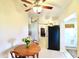 Eat-in dining area, showing tile floors and views to kitchen and front door at 5351 Sw 80Th Pl, Ocala, FL 34476