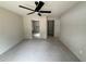 Bedroom view reveals open hallway to bathroom and closet at 5359 Nw 55Th Pl, Ocala, FL 34482