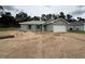 Charming one-story home with a two-car garage and gray roof at 5359 Nw 55Th Pl, Ocala, FL 34482