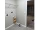Entry into garage with metal shelving on the wall, light paint, and concrete floor at 5359 Nw 55Th Pl, Ocala, FL 34482