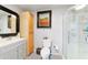 Bathroom featuring vanity, toilet, medicine cabinet and step-in shower at 5521 Sw 31St St, Ocala, FL 34474