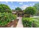 Charming home with lush landscaping, a walkway, and a welcoming entrance at 5521 Sw 31St St, Ocala, FL 34474
