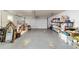 Spacious garage with ample storage space and overhead door at 5521 Sw 31St St, Ocala, FL 34474