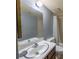Bathroom featuring a vanity, mirror, toilet and shower and tub combination at 559 Fairway Circle # A, Ocala, FL 34472
