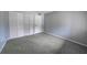 Bedroom with neutral walls and closet providing ample storage at 559 Fairway Circle # A, Ocala, FL 34472