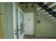 The condo entrance provides access to the unit with security door and staircase at 559 Fairway Circle # A, Ocala, FL 34472
