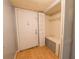 Entryway showcasing a closet with a built-in bench, offering a practical space at 559 Fairway Circle # A, Ocala, FL 34472