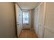 Entryway with wood floors and closet space and a view of the porch at 559 Fairway Circle # A, Ocala, FL 34472