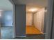 Inviting entryway featuring hardwood floors and a convenient coat closet at 559 Fairway Circle # A, Ocala, FL 34472