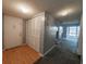 Entryway with carpeting adjacent to the living room and the front door at 559 Fairway Circle # A, Ocala, FL 34472