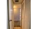 Hallway with closet and doorway to a room with carpet and a window at 559 Fairway Circle # A, Ocala, FL 34472