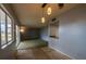View of the living room features carpet and sliding glass doors at 559 Fairway Circle # A, Ocala, FL 34472