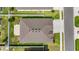 Aerial view of the property's roof, yard, driveway, and proximity to the street at 5862 Sw 80Th Ln, Ocala, FL 34476