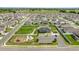 Aerial view of neighborhood amenities including a playground and green space at 5862 Sw 80Th Ln, Ocala, FL 34476