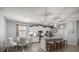 Stylish, modern kitchen with white cabinets, granite countertops, and stainless steel appliances at 5862 Sw 80Th Ln, Ocala, FL 34476