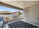 Enclosed lanai with screened walls offering views of patio with outdoor dining set, furniture, and backyard at 5862 Sw 80Th Ln, Ocala, FL 34476