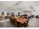 Spacious living room and dining area featuring recessed lighting and a large dining table at 5862 Sw 80Th Ln, Ocala, FL 34476