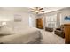 Bright bedroom with a large window and comfortable decor at 6436 Sw 44Th Ct, Ocala, FL 34474