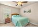 Cozy bedroom with neutral walls and carpeted floors at 6436 Sw 44Th Ct, Ocala, FL 34474