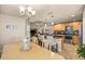 Open concept dining room featuring a chandelier and lots of natural light at 6436 Sw 44Th Ct, Ocala, FL 34474