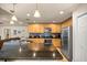 A lovely kitchen with stainless steel appliances and granite countertops at 6436 Sw 44Th Ct, Ocala, FL 34474