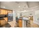 A modern kitchen with stainless steel appliances and a granite island at 6436 Sw 44Th Ct, Ocala, FL 34474