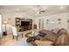 A lovely living room with a large sectional couch and vaulted ceilings at 6436 Sw 44Th Ct, Ocala, FL 34474