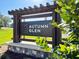 Community sign for Autumn Glen with landscaping, stone base, and modern design at 7101 Se 113Th Ln, Belleview, FL 34420
