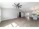Spacious living area with contemporary design elements and seamless transition to the kitchen at 7483 Sw 121St Ter, Dunnellon, FL 34432
