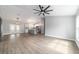 Expansive living room with an open floor plan connecting to the kitchen and dining areas at 7483 Sw 121St Ter, Dunnellon, FL 34432