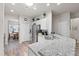 Open concept kitchen with granite countertops, stainless steel appliances, and breakfast bar seating at 808 Overlook Grove Dr, Winter Haven, FL 33884