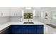 The updated kitchen is designed with stainless appliances, modern countertops, and bright natural light at 8712 Sw 92Nd St # C, Ocala, FL 34481