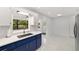 The modern kitchen features stainless steel appliances, modern countertops, and stylish cabinetry at 8712 Sw 92Nd St # C, Ocala, FL 34481