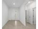 Spacious foyer with tile flooring, providing a welcoming entrance with ample natural light at 8783 Sw 69Th Place Rd, Ocala, FL 34481