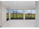 Screened lanai offers outdoor living with views of the backyard at 8783 Sw 69Th Place Rd, Ocala, FL 34481