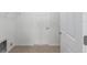 Laundry room with tile flooring and a white door at 8783 Sw 69Th Place Rd, Ocala, FL 34481