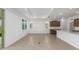 Bright living space featuring recessed lighting, tile floors, and a view into the kitchen at 8783 Sw 69Th Place Rd, Ocala, FL 34481