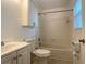 Well-lit bathroom with a shower-tub combination, vanity, and tile surround at 9 Pine Radial Ct, Ocala, FL 34472