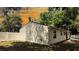 Rear exterior of the house next to the white privacy fence at 9 Pine Radial Ct, Ocala, FL 34472