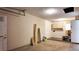 Spacious garage with a roll-up door and ample room for parking and storage at 9 Pine Radial Ct, Ocala, FL 34472