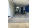 Covered carport offers sheltered parking with access to storage and a view of the yard at 9920 Sw 102Nd Pl, Ocala, FL 34481