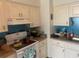 Traditional kitchen featuring white cabinets, stainless sink and updated appliances at 9920 Sw 102Nd Pl, Ocala, FL 34481