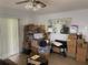 Bright living room area with boxes piled throughout the space. (Moving boxes in evidence) at 9920 Sw 102Nd Pl, Ocala, FL 34481