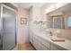 Clean bathroom showcasing a glass door shower and vanity with countertop space offering a functional design at 10347 Se 178Th Pl, Summerfield, FL 34491