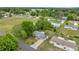 Aerial view highlighting the home's setting amidst the surrounding neighborhood and landscape at 11091 Sw 76Th Ter, Ocala, FL 34476