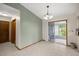 The dining room featuring tile floors and a sliding door out to the lanai at 11091 Sw 76Th Ter, Ocala, FL 34476