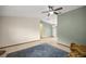 A spacious living room with light colored tile flooring at 11091 Sw 76Th Ter, Ocala, FL 34476