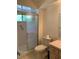 Ensuite bathroom features a stand up shower with glass doors at 11445 Sw 84Th Avenue Rd, Ocala, FL 34481