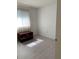 Cozy room with light flooring and bright window. Perfect for guest or children at 11445 Sw 84Th Avenue Rd, Ocala, FL 34481