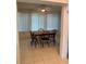 Eat-in dining room offers a ceiling fan and natural light from the window at 11445 Sw 84Th Avenue Rd, Ocala, FL 34481